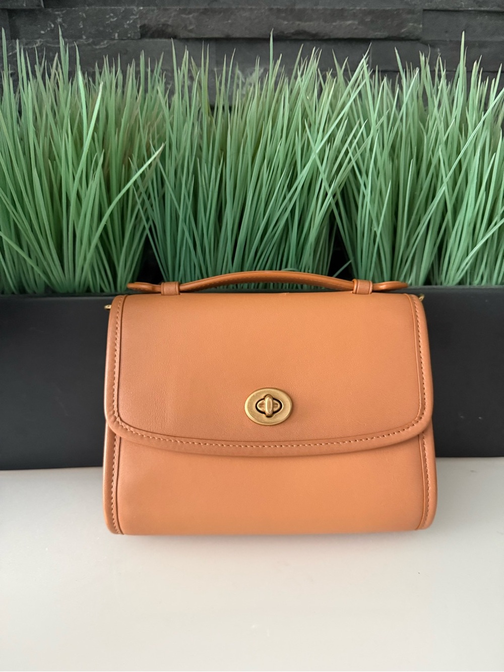 Coach Kip Turn-Lock crossbody